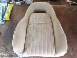 PMD seat covered with new upholstery